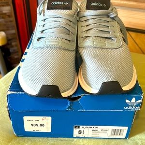 NWT Women’s Baby Blue Adidas with Black stripes *Never Worn*